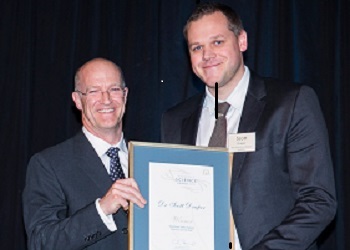 Dr Scott Draper receives his Premier