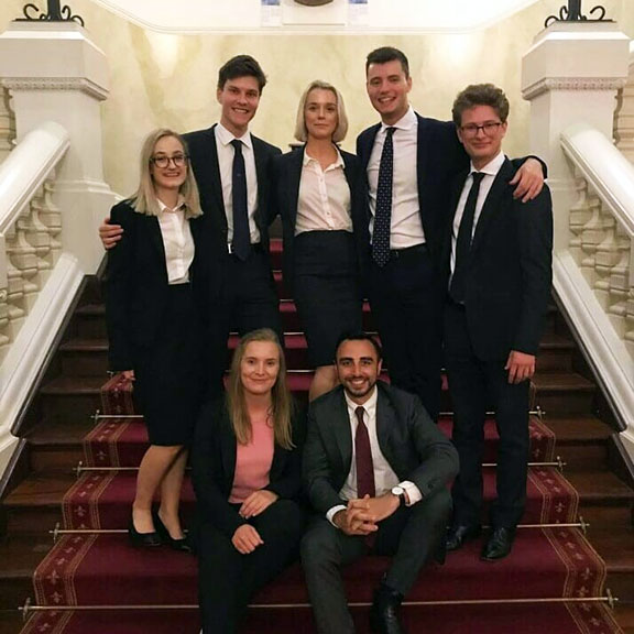 UWA Jessup Moot team standing on stairs together
