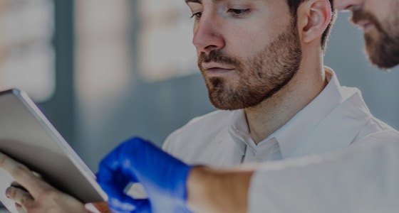 man looking attablet