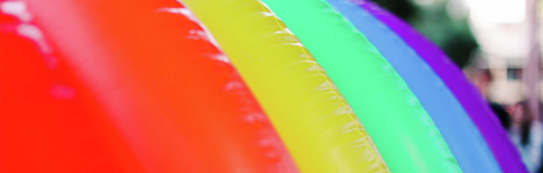 close up of a rainbow flag blow up 