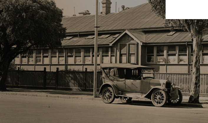 black and white photo of Irwin Street building from early 20th Centruy