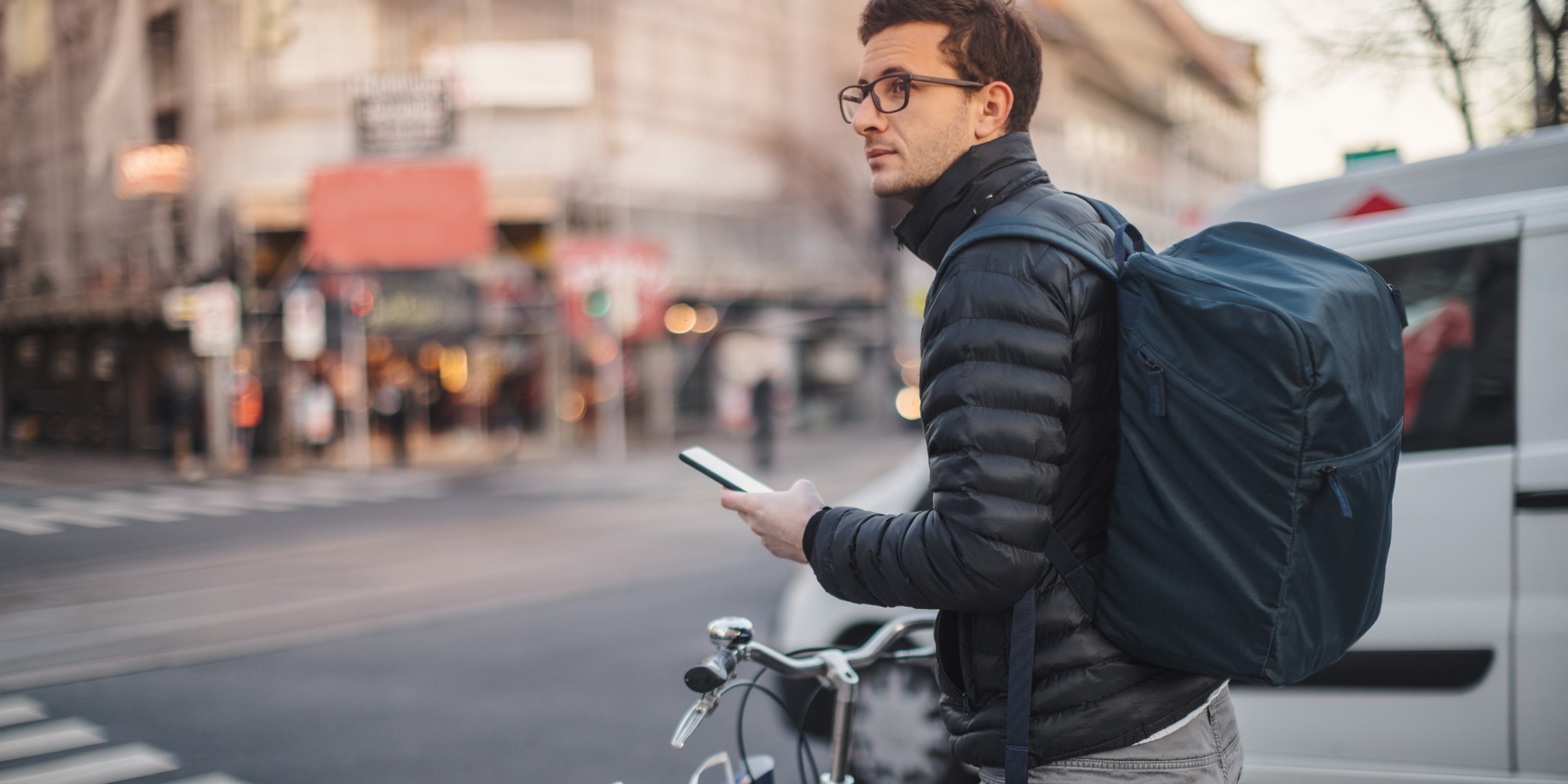 man on motorcycle  looking at map