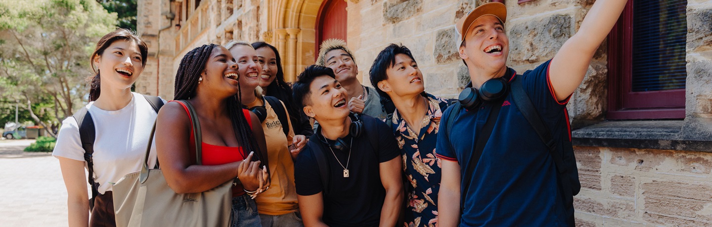UWA CELT Students posing for a photo outside the heritage building at the Claremont campus