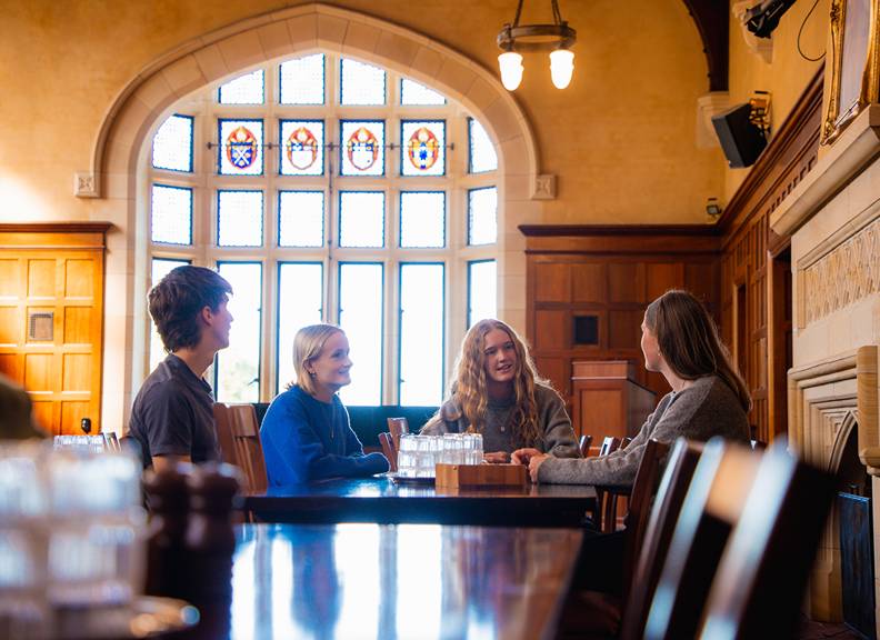 Image of student sitting together in a dinning hall