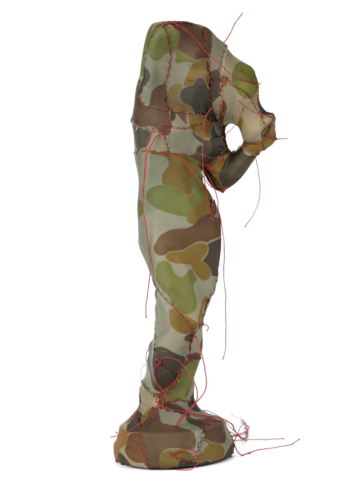 Classic statue of a figure carrying a pitcher, covered in camouflage fabric