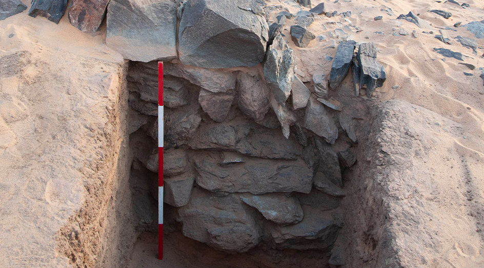 Measuring the inside of one of the Nubian walls