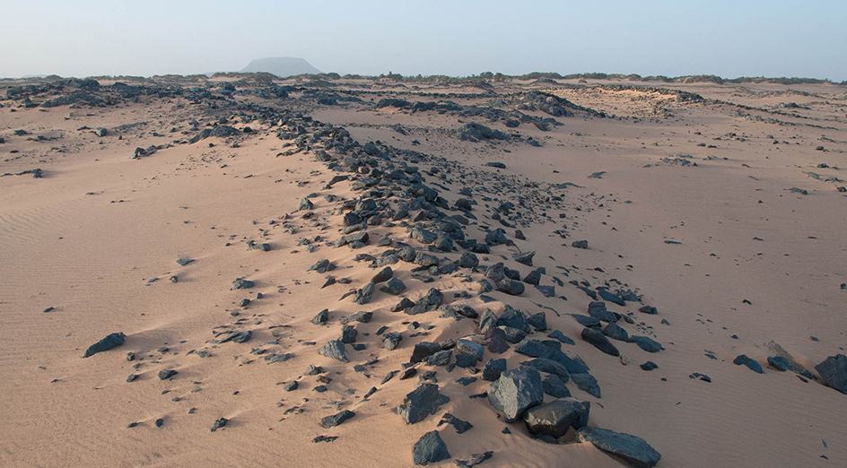 One of the Nubian walls which was located in a dried river bed in what is now desert