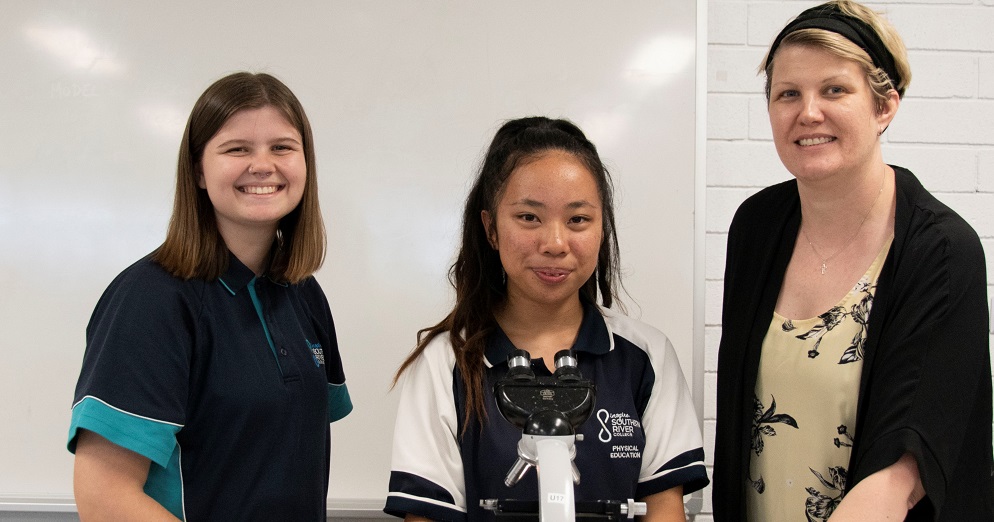 Students with microscopes