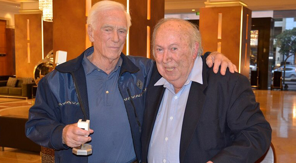 Astronaut Gene Cernan, the last person to walk on the Moon, and Professor Brian O’Brien, 2016. Image: Kindly supplied by Guy Holmes, Tape Ark.)