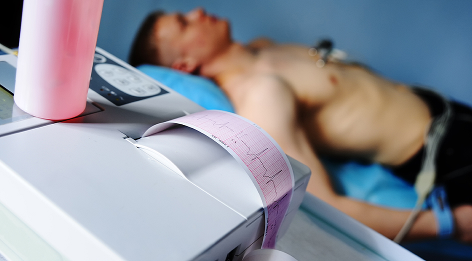 Male patient lying on bed