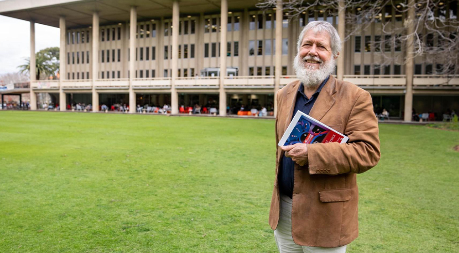 Professor David Blair standing outside UWA's Reid Library