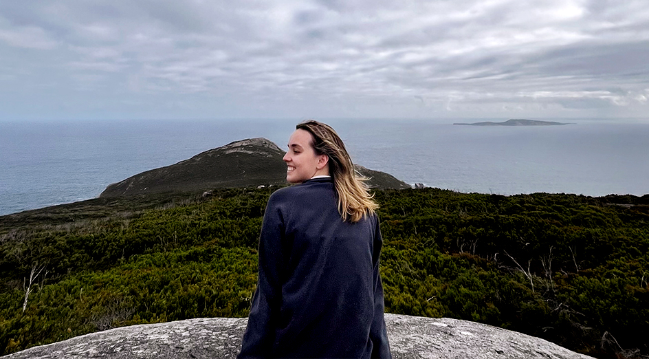 UWA Doctor of Optometry graduate Lydia Thorne overlooking Albany's coastline.