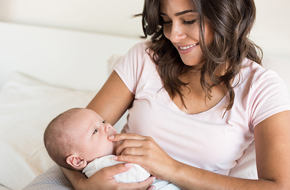 woman holding a baby