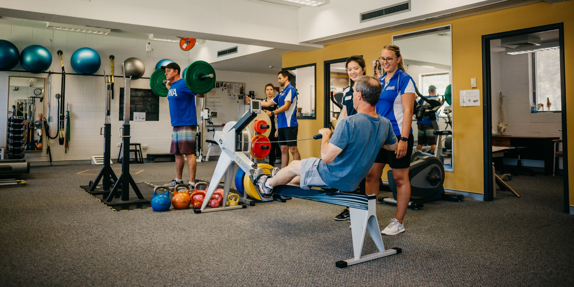 Clients and students working out in UWA Exercise Performance Centre.