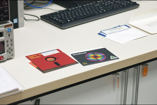 Four 5.25 inch floppy disks on the desk
