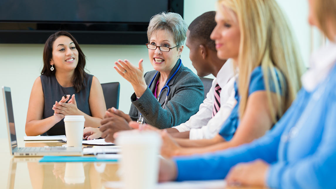 Academics discussing corporate clinical work