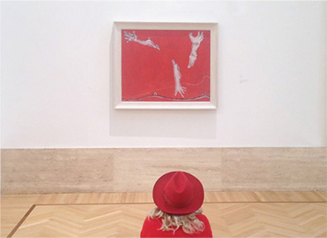 Image of person looking at artwork