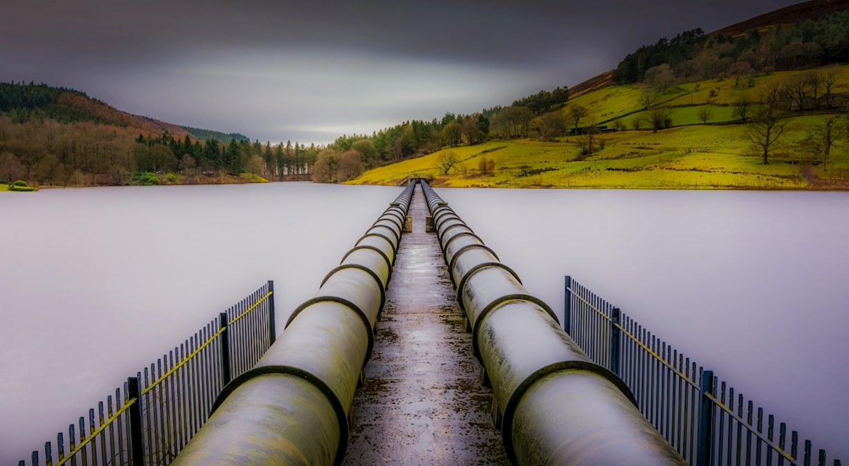 Two pipes leading to river