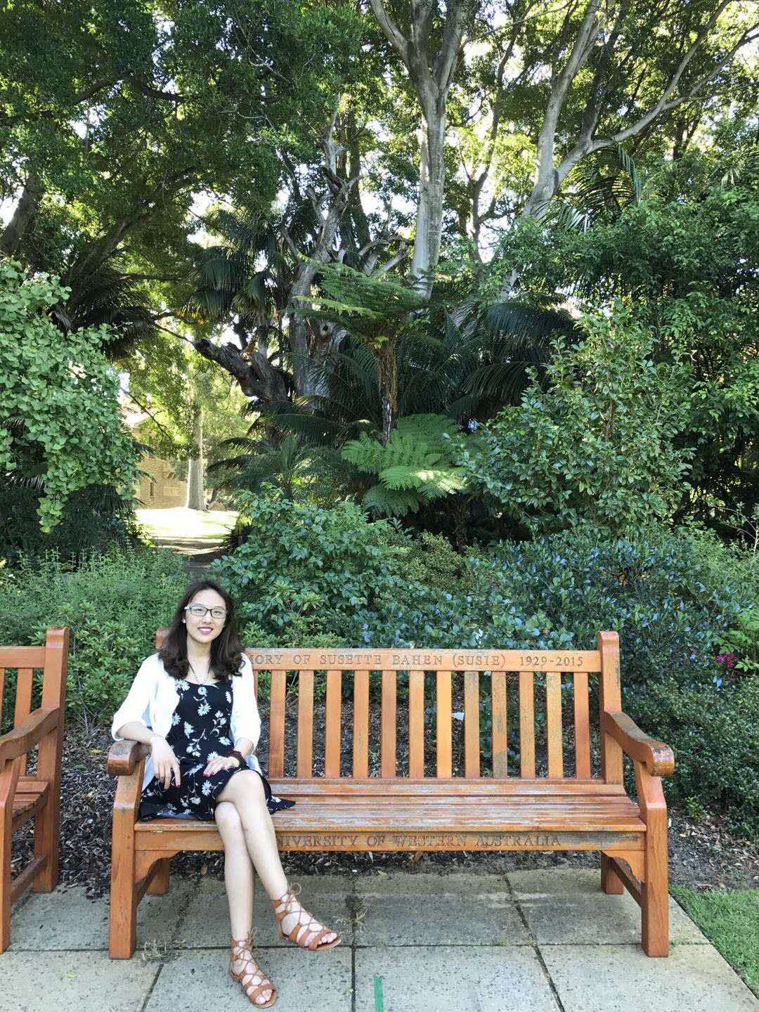 Tina on a bench at UWA