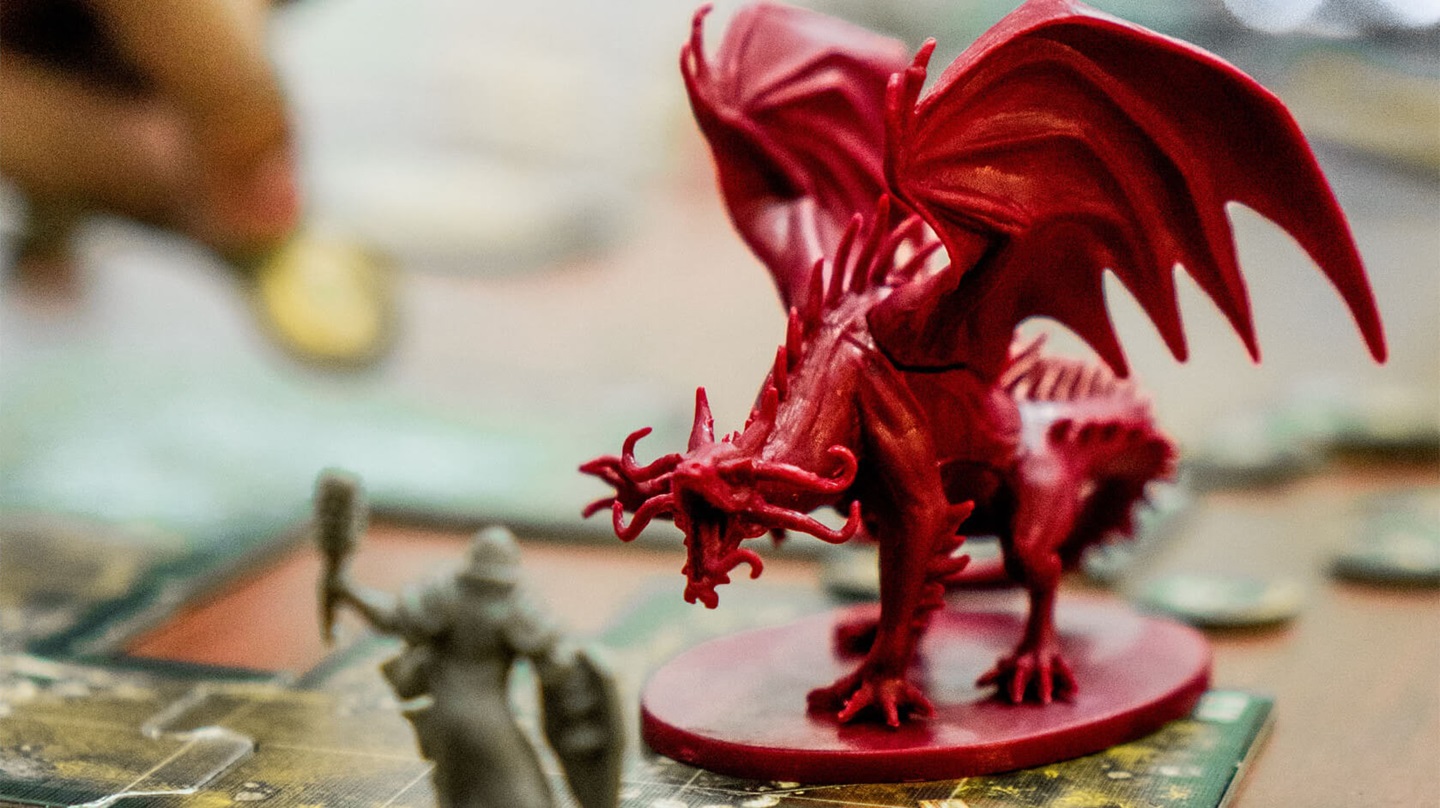 A red dragon piece on a game board