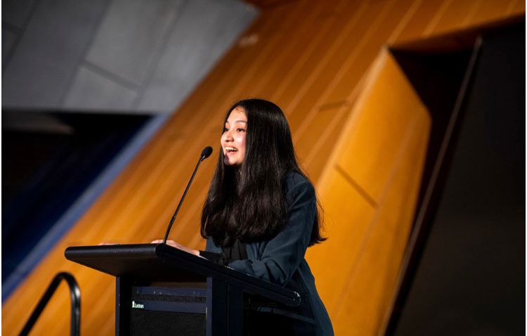 Chandini making a speech at a Study Perth event