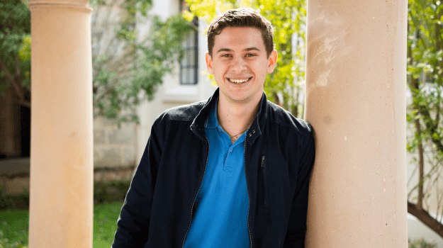 Headshot photo of Elliot