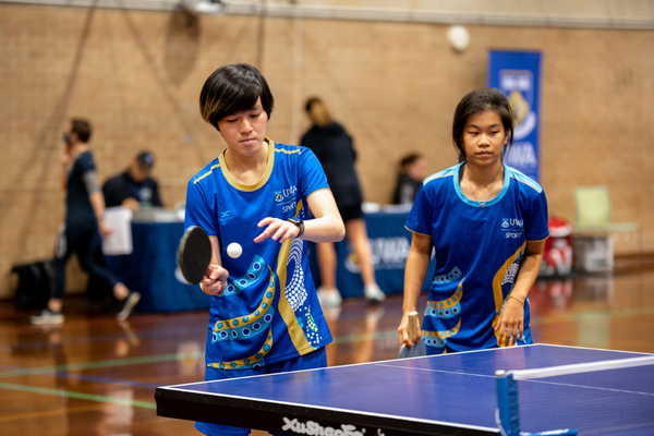 Two UWA Students playing table tennis during Western Series