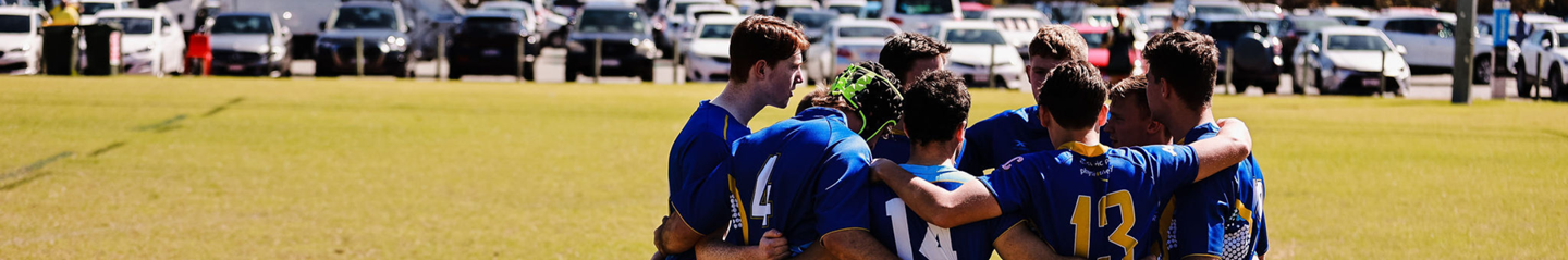 A UWA Nationals team in a huddle