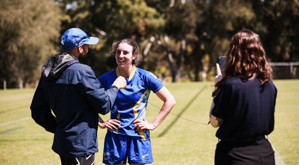 UWA Sport staff interview an athlete for social media content