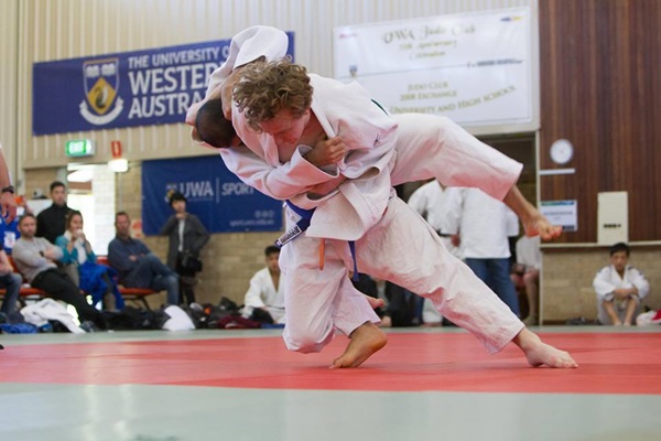 UWA Judo Club members grapple on a tatami mat