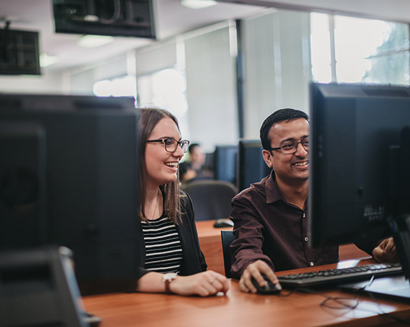 Male and female in a computer lab