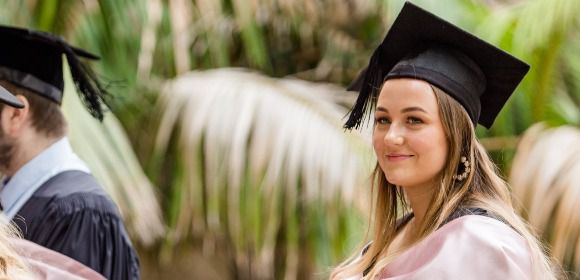 student in graduation garb