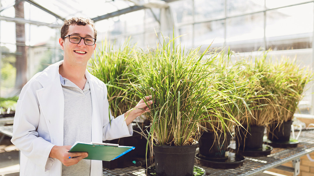 student with plants