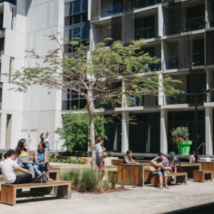 Students sitting outside of University Hall