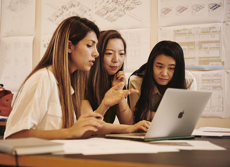 students at laptop