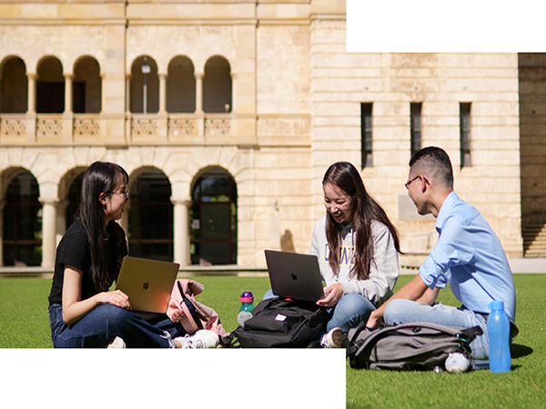 University of Western Australia students sitting on grass outside Wintrop Hall