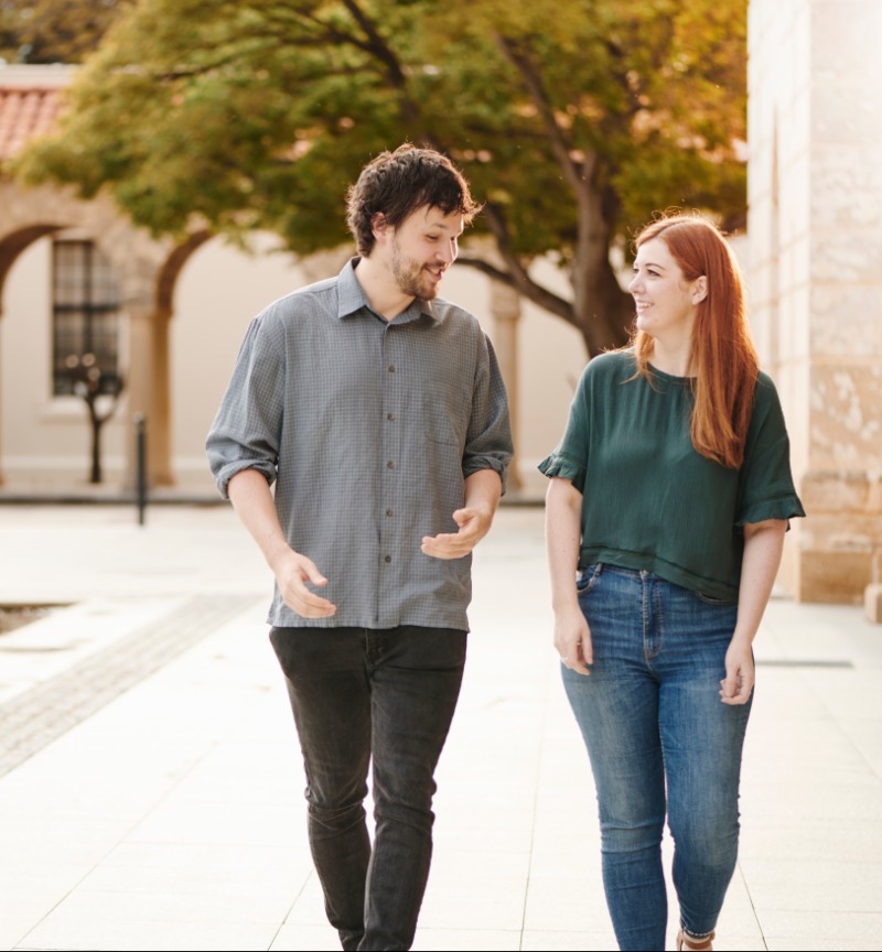 Two people walking together 