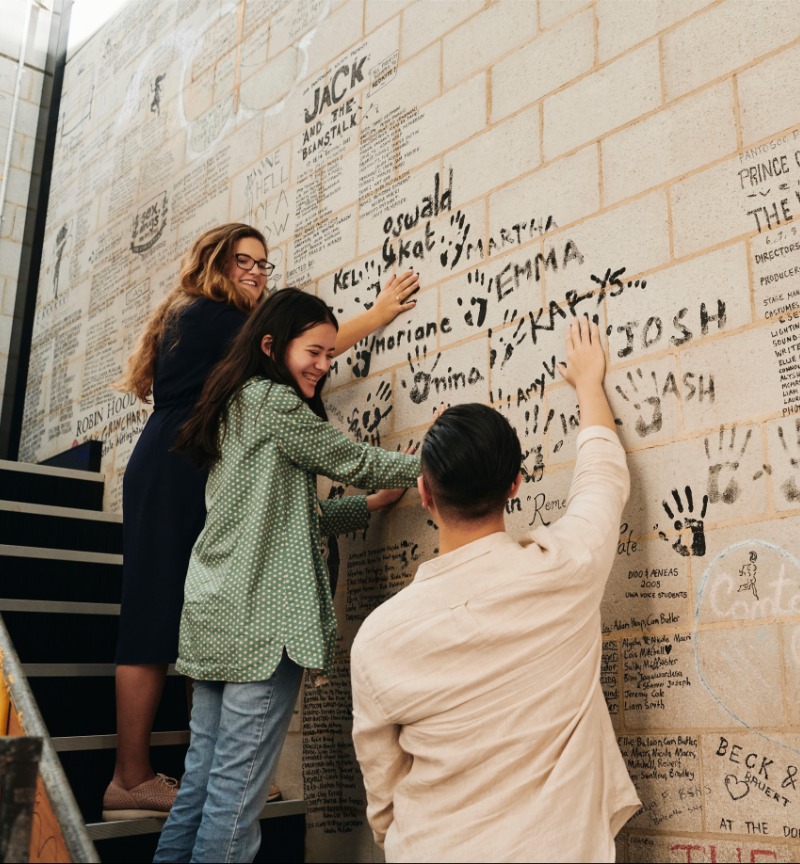 Students hanging out in a UWA building. 