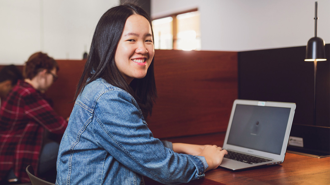 student at laptop