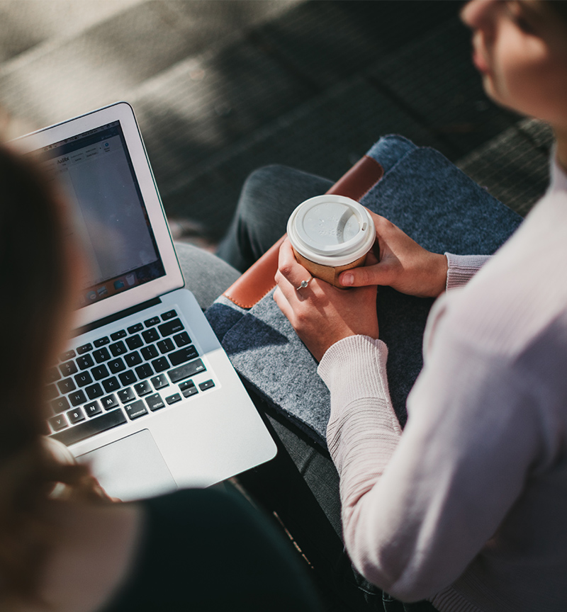 Students on laptop and drinking coffee